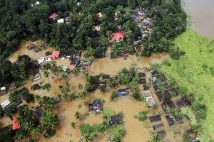 Partially submerged houses in Kerala, India last August.