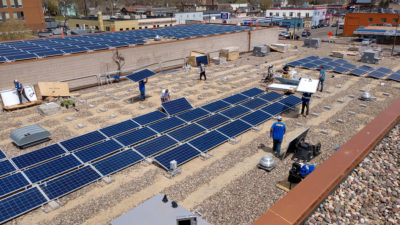 A 204-kilowatt community solar array being installed on the roof of the Shiloh Temple International Ministries in Minneapolis.