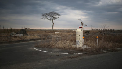 A radiation monitoring station alongside a road in Namie, Japan.