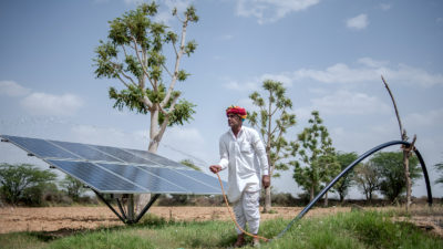 Hari Ram uses a solar-powered pump to supply water to his farm in Solawata, India.