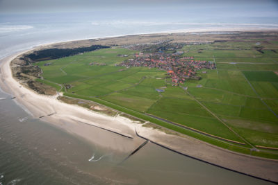 Beach stabilization projects and a dike behind the sand protect a town in the northern Netherlands.View gallery.