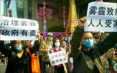 Protestors in Beijing following the release of the viral documentary about Chinese air pollution "Under the Dome" in 2015. 