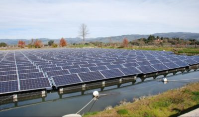 Floating solar panels on an irrigation pond at the Far Niente Winery in Oakville, California.