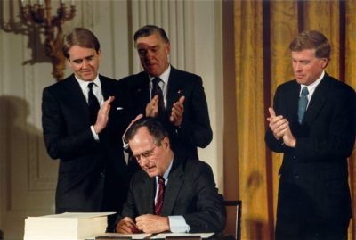 President George H.W. Bush signing the Clean Air Act Amendments in 1990.