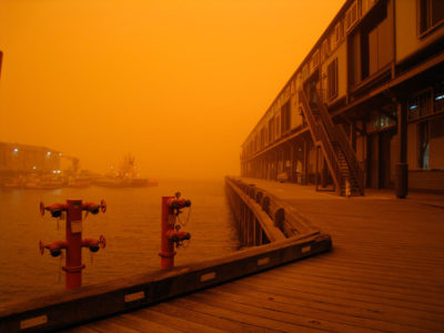 A massive dust storm in Australia in 2009, known as the Red Dawn, as seen from the Sydney waterfront.