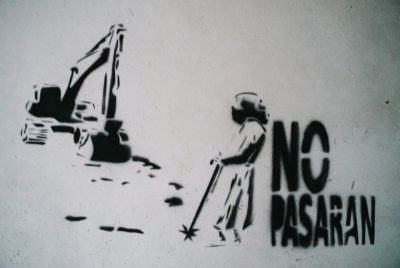 On the walls of COPINH’s training center in La Esperanza, graffiti calls for opposition to the Agua Zarca dam project.