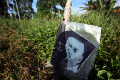 A photo memorializing Bill Kayong by the road where he was killed.
