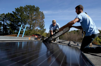 A solar panel is installed on the roof of a house in San Rafael, California.