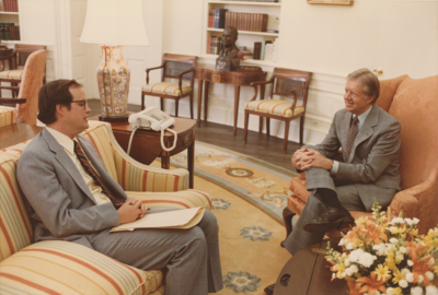 Speth with President Jimmy Carter in the Oval Office in 1978 discussing a Council on Environmental Quality report on global environmental issues.
