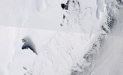 Warm ocean water has begun eating away at East Antarctica's Totten Glacier, with cracking in the ice and pockets of open water visible in satellite imagery taken in September 2013.