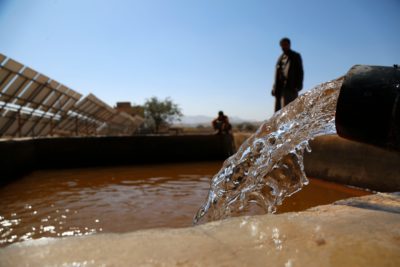 Water pours from a solar-powered pump near Sana'a, Yemen.