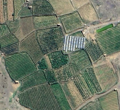 A satellite image of solar panels on farmland in Yemen.