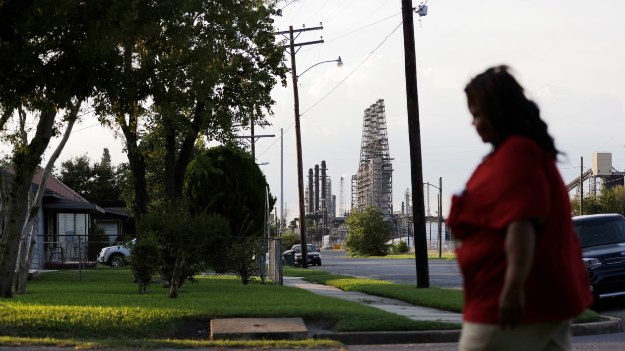 A residential street alongside a major oil refinery in Port Arthur, Texas, a city that is more than two-thirds African American and Latino.