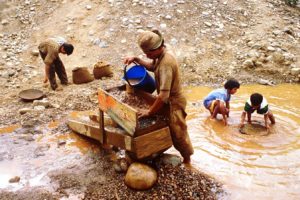 Miners pan for gold near San Juanito, Bolivia.
