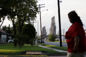 A residential street alongside a major oil refinery in Port Arthur, Texas, a city that is more than two-thirds African American and Latino.