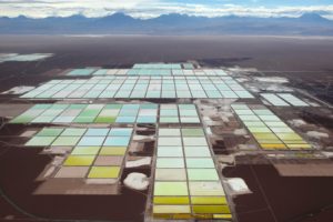 Brine pools at the Soquimich lithium mine on a salt flat in northern Chile.