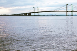 The Delaware River flows under the Delaware Memorial Bridge, near Wilmington.