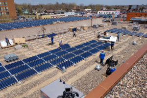 A 204-kilowatt community solar array being installed on the roof of the Shiloh Temple International Ministries in Minneapolis.
