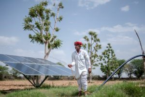 Hari Ram uses a solar-powered pump to supply water to his farm in Solawata, India.