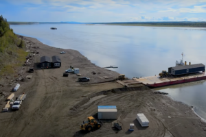 A prefabricated house delivered by barge to the Sahtu village of Tulita in 2022. Recent deliveries have been cancelled because of low water levels on the Mackenzie River.