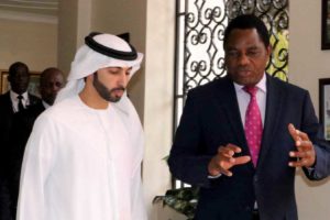 Sheikh Ahmed Dalmook Al Maktoum with Zambian president Hakainde Hichilema upon signing a memorandum of understanding for Sheikh Ahmed's firm to manage and sell carbon credits from Zambian woodlands.