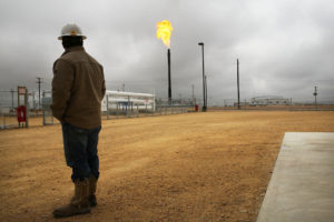 Flared natural gas is burned off at a processing plant in Garden City, Texas. 