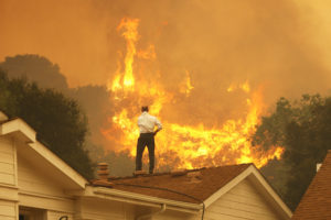 The Springs Fire encroaching on a house in Camarillo, California in 2013.