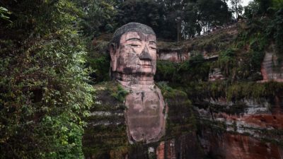 The Leshan Giant Buddha in Sichuan, China, a relic of the Tang dynasty, which collapsed in 907 A.D. amid changes in the climate.