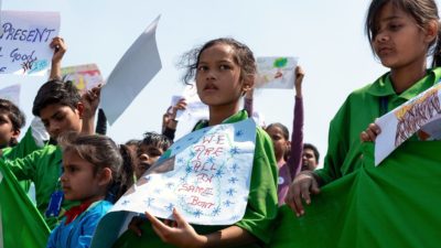 Children in New Delhi, India take part in a youth climate strike in 2019.