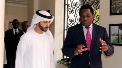 Sheikh Ahmed Dalmook Al Maktoum with Zambian president Hakainde Hichilema upon signing a memorandum of understanding for Sheikh Ahmed's firm to manage and sell carbon credits from Zambian woodlands.