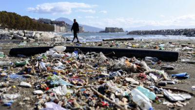 A beach in Naples, Italy covered in plastic waste following a storm in 2018.