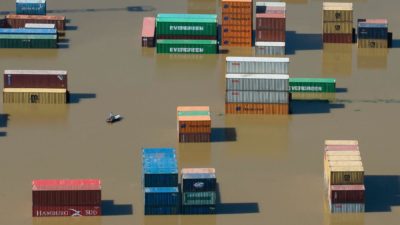 Shipping containers stranded in floodwaters at the harbor in Riesa, Germany.