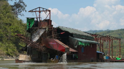 A gold-dredging boat on the Mali River in Kachin State, Myanmar.