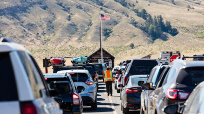 Visitors wait to enter Yellowstone National Park in June 2017.