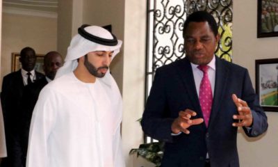 Sheikh Ahmed Dalmook Al Maktoum with Zambian environment minister Collins Nzovu upon signing a memorandum of understanding for Sheikh Ahmed's firm to manage and sell carbon credits from Zambian woodlands.