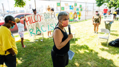 Activists with the environmental organization Philly Thrive gather in front of the former refinery site in June 2020 to commemorate the one-year anniversary of the explosion that shut down the facility.