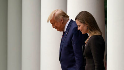 President Trump walks with Judge Amy Coney Barrett to a news conference to announce her nomination to the Supreme Court on September 26.