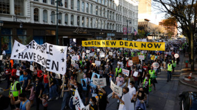 Biden supporters, including climate activists advocating the Green New Deal, celebrate in Philadelphia on November 7. 