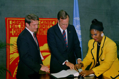 President George H. W. Bush signing the United Nations Framework Convention on Climate Change, June 12, 1992. 