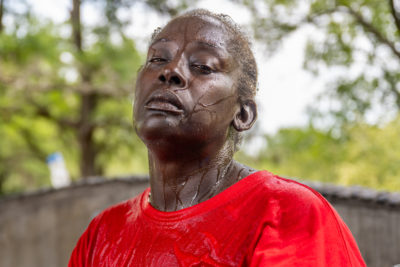 Andrea Washington after pouring water on herself during a heat wave in Austin, Texas in July 2023.