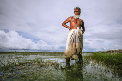 When saltwater contaminated Abdul Majed's rice farm in Khulna, Bangladesh, he converted his paddies into a shrimp farm.