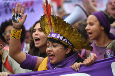 An indigenous woman protests against then-candidate Jair Bolsonaro, who has promised to ban the creation of new protected areas or indigenous territories, in Sao Paulo in October.