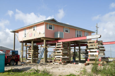 A home in Crystal Beach, Texas being lifted out of the floodplain using FEMA funds. 