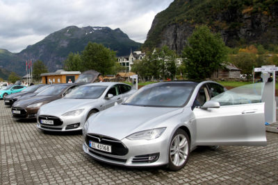 A row of Tesla Model S all-electric cars at an EV festival in Geiranger, Norway.