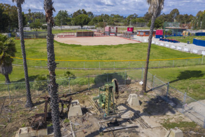 An oil well next to a baseball field in the Wilmington neighborhood of Los Angeles.