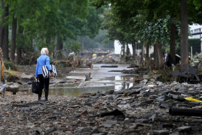 A woman walks through Bad Neuenahr-Ahrweilerin, Germany on July 16, after it was devastated by floods.
