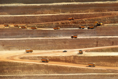 Trucks hauling coal at a Chinese-financed open-pit mine in Pakistan's Sindh province in May 2018.