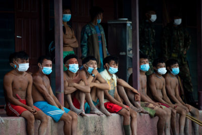 Yanomami Indigenous people await medical attention amid the Covid-19 pandemic on July 1 in Roraima, Brazil.