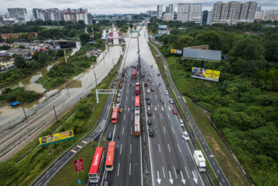 Malaysia's Federal Highway from Kuala Lumpur to the port of Klang shut down due to flooding last December.