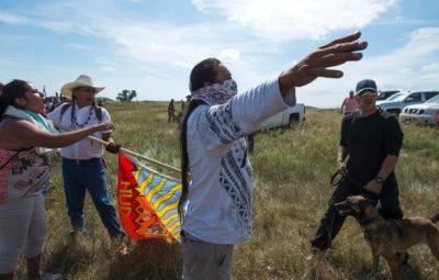Native American protestors face private security guards at a work site for the Dakota Access pipeline, near Cannon Ball, North Dakota, in 2016.